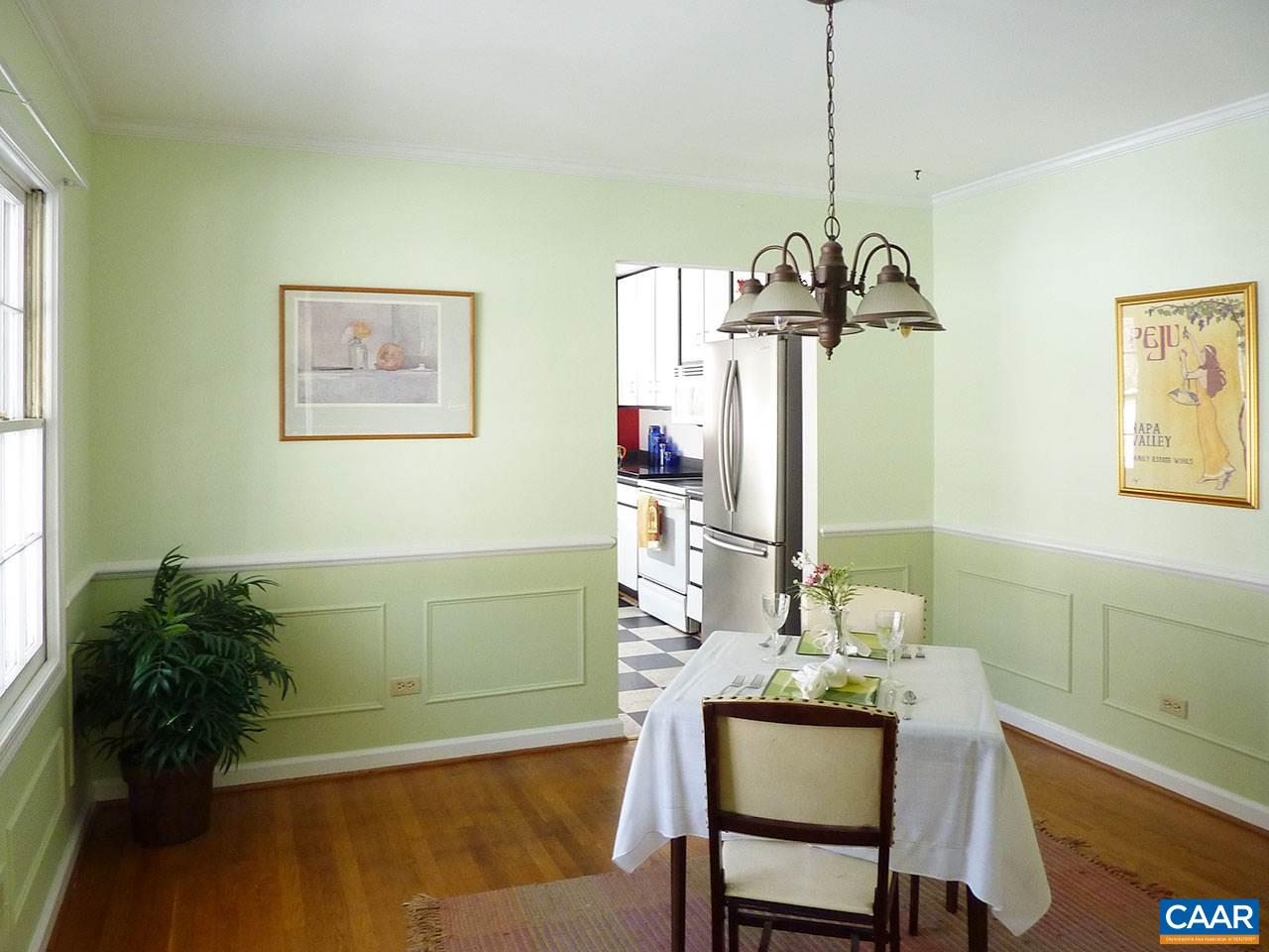 720 Village Road Charlottesville, VA 22903 - Photo 5 of 22 a dining room with table and chairs