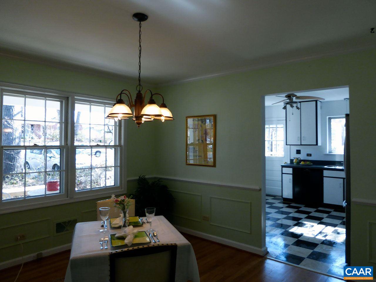 720 Village Road Charlottesville, VA 22903 - Photo 6 of 22 a dining room with furniture window and wooden floor