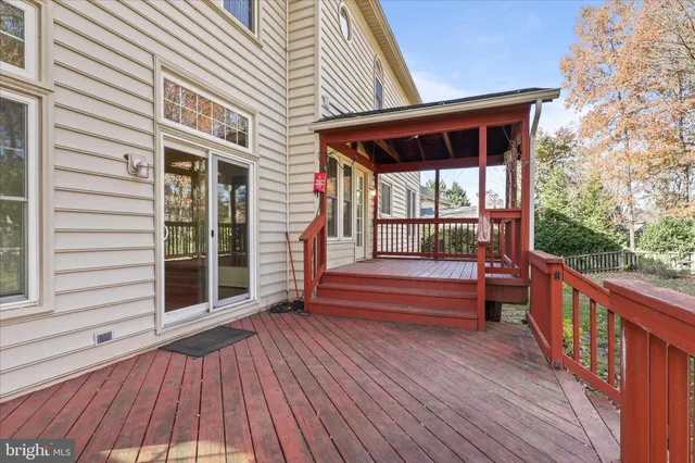 a view of outdoor space with deck and wooden floor