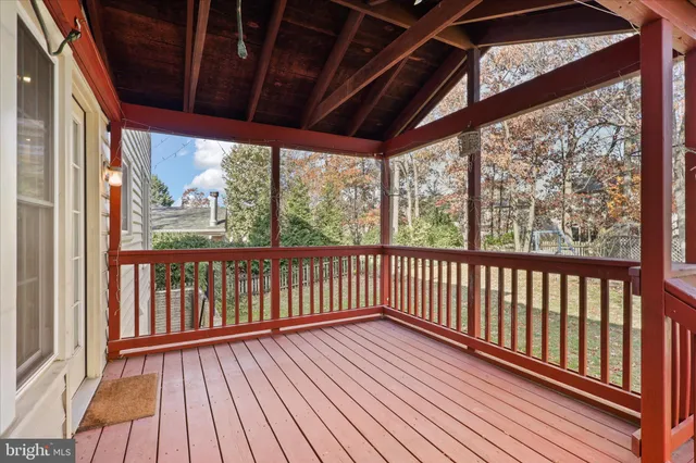 a view of wooden balcony with wooden floor