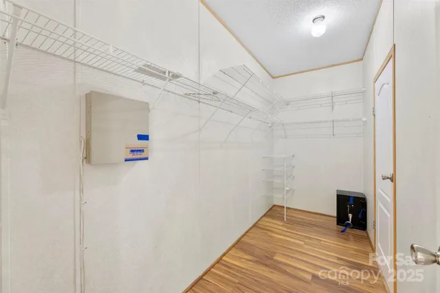 a large kitchen with a large window in it and kitchen island