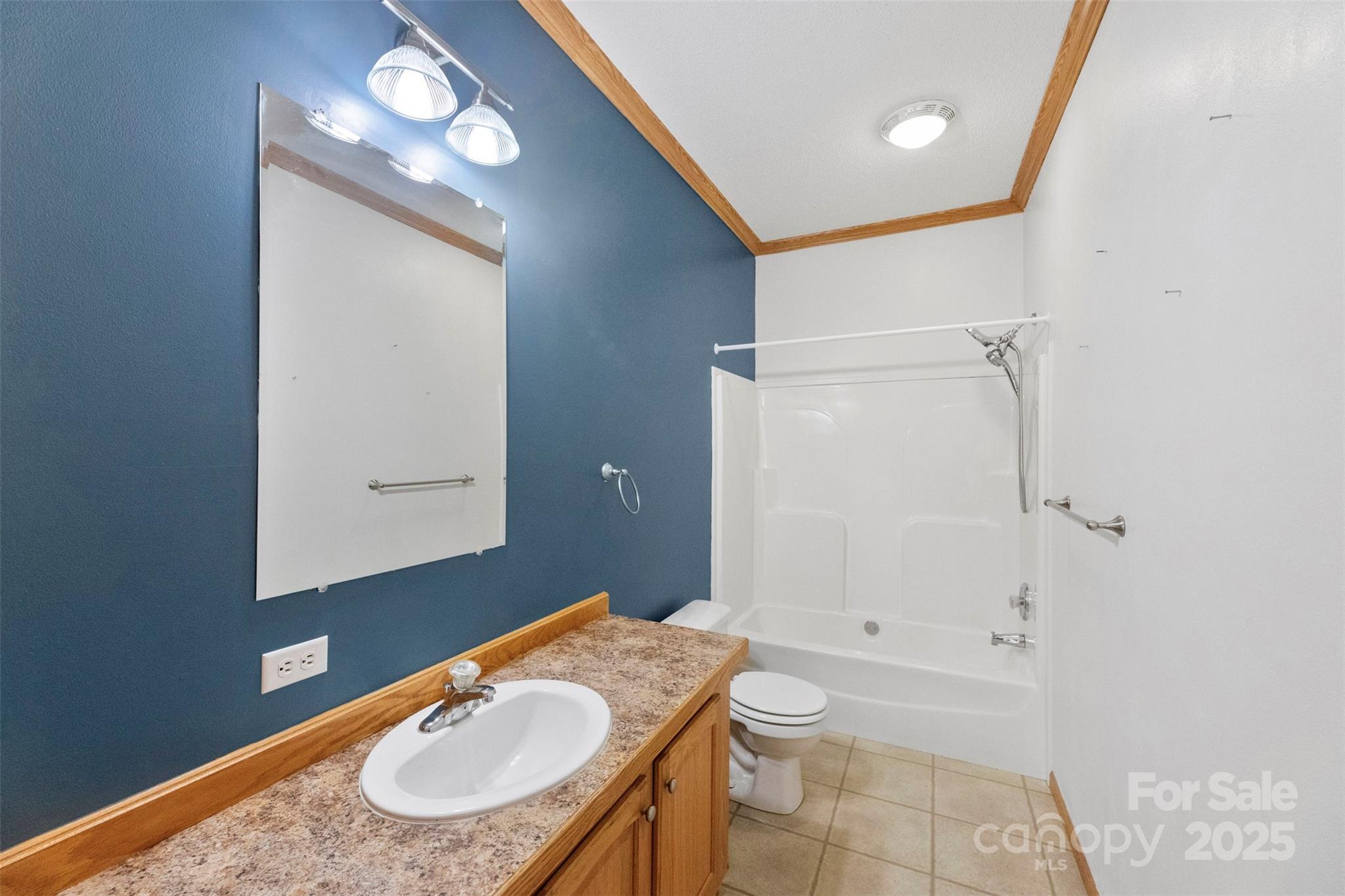2411 Mission Road York, SC 29745 - Photo 16 of 30 a bathroom with a granite countertop sink and a mirror