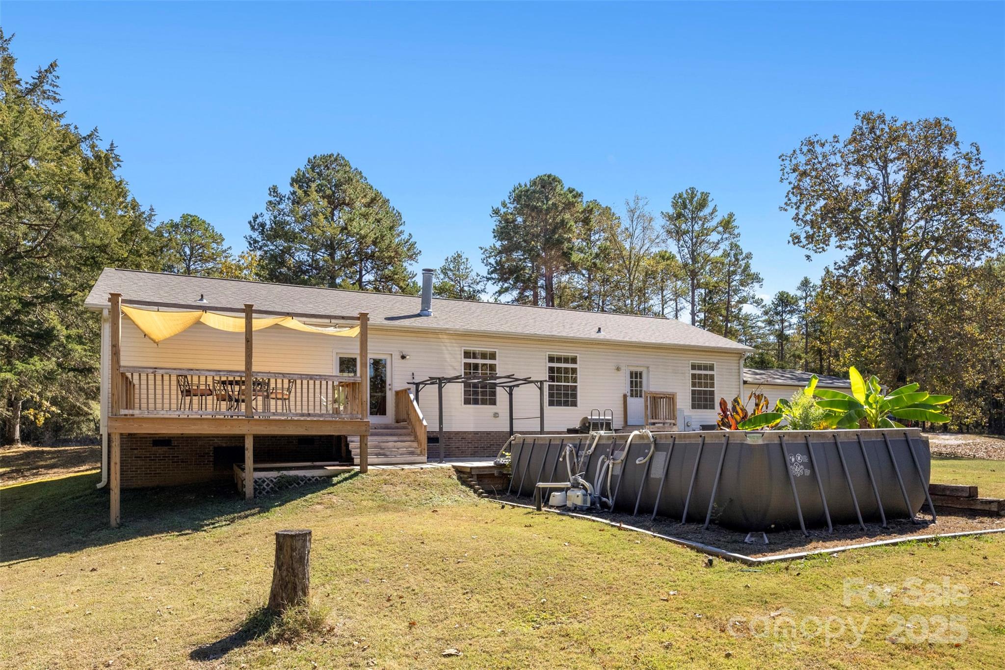 2411 Mission Road York, SC 29745 - Photo 24 of 30 a view of a house with a yard and sitting area