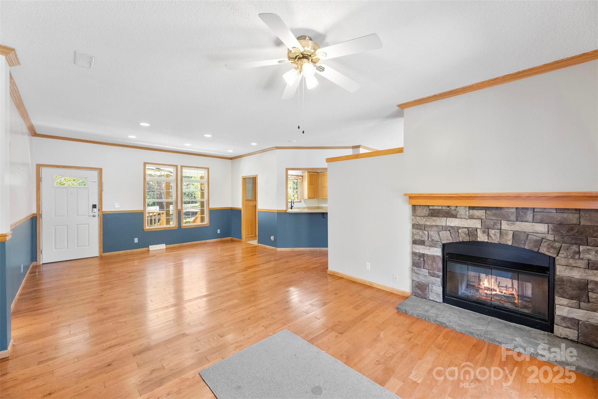 2411 Mission Road York, SC 29745 - Photo 4 of 30 a view of an empty room with a fireplace and a window