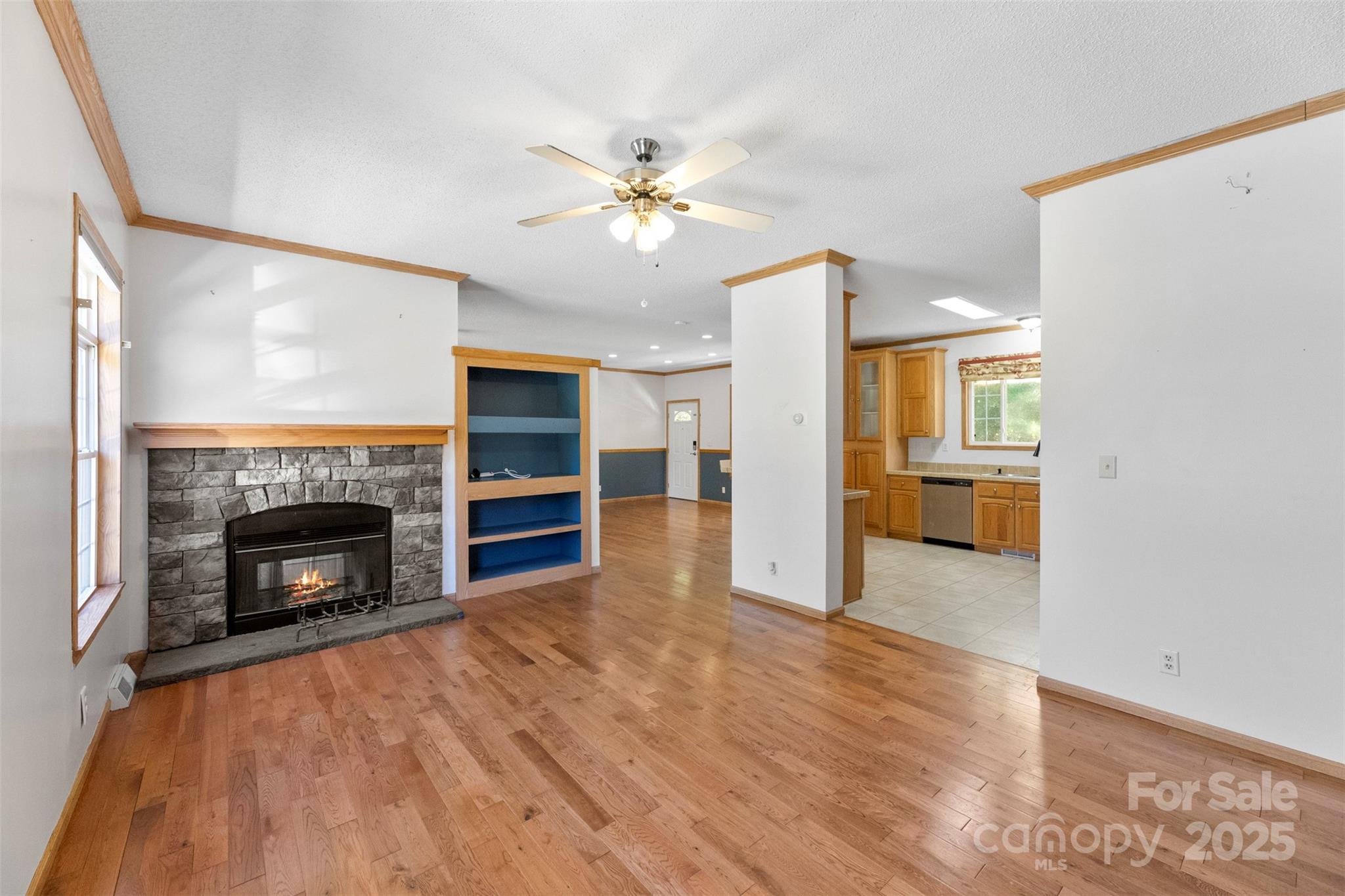 2411 Mission Road York, SC 29745 - Photo 5 of 30 a view of a livingroom with a fireplace and chandelier fan