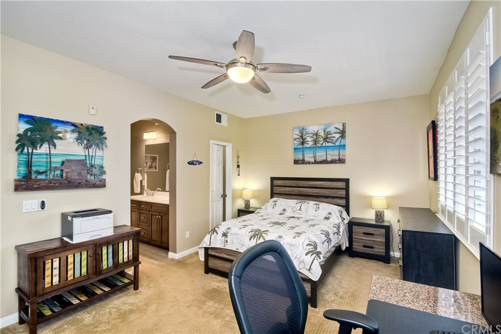 4115 Karst Road Carlsbad, CA 92010 - Photo 22 of 33 a bedroom with a bed furniture and window