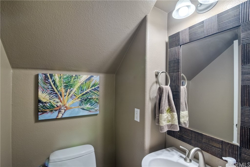 4115 Karst Road Carlsbad, CA 92010 - Photo 5 of 33 a bathroom with a toilet and a shower