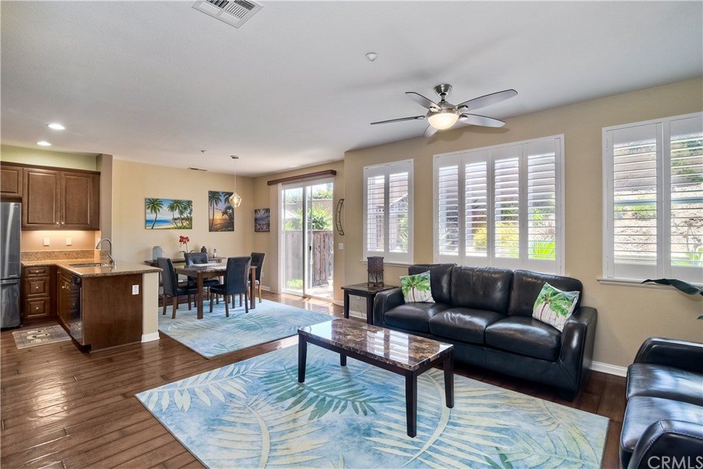 4115 Karst Road Carlsbad, CA 92010 - Photo 6 of 33 a living room with furniture and a large window