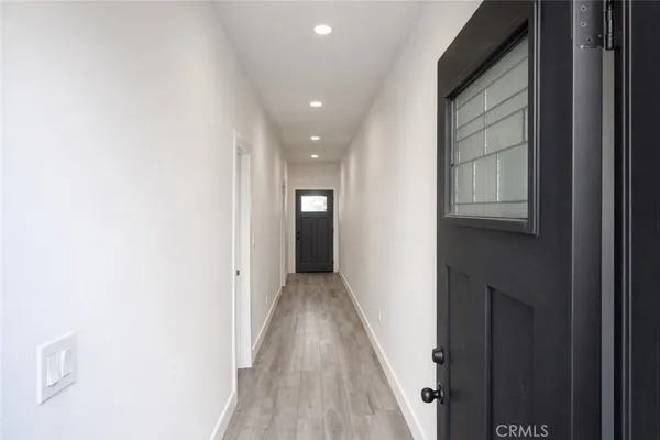 a view of hallway with stairs
