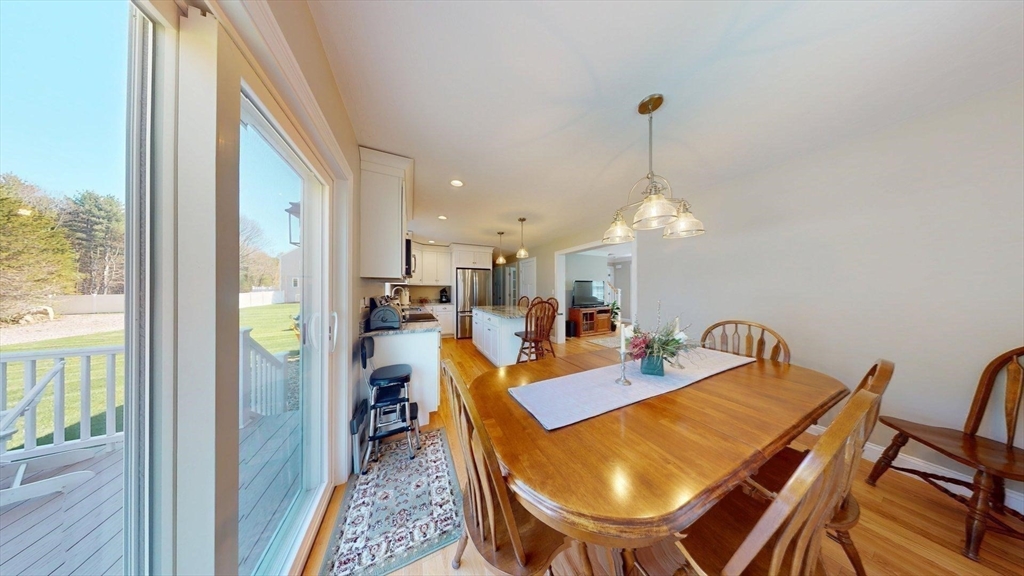 287 Wareham Street Middleboro, MA 02346 - Photo 5 of 28 a dining room with furniture a chandelier and wooden floor