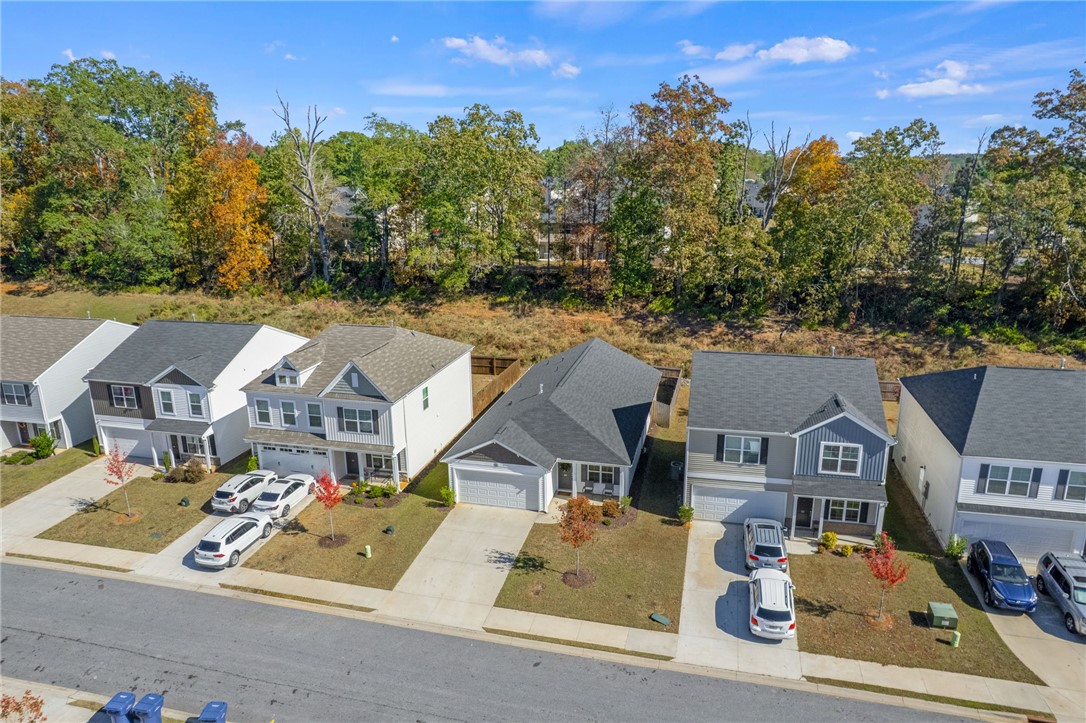 24 Chalet Court Anderson, SC 29621 - Photo 35 of 39 This inviting aerial view showcases a vibrant community with charming homes and lush surrounding nature.