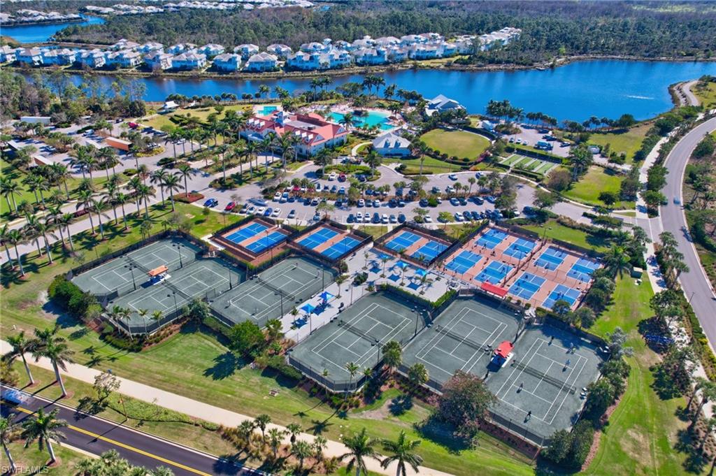8813 Yucatan Court Naples, FL 34113 - Photo 37 of 43 Aerial view of Tennis and Pickle ball courts