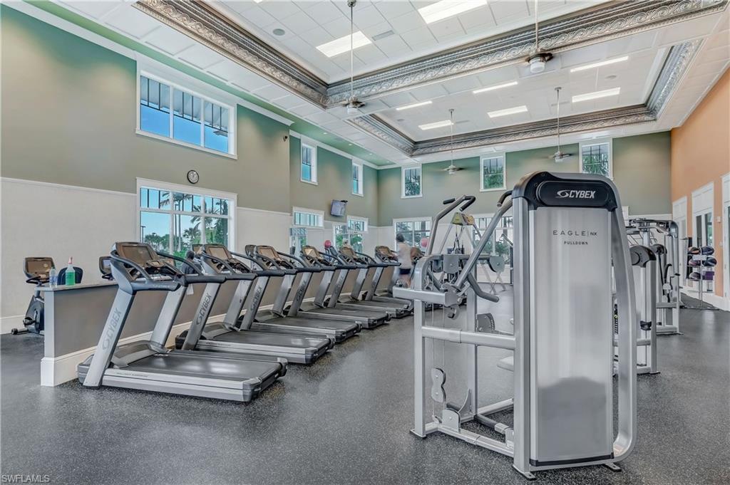 8813 Yucatan Court Naples, FL 34113 - Photo 41 of 43 Workout area with a high ceiling and ornamental molding