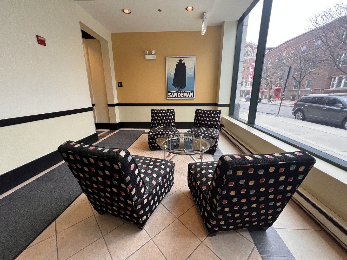 4715 North Racine Avenue, Unit 303 Chicago, IL 60640 - Photo 12 of 18 a living room with furniture