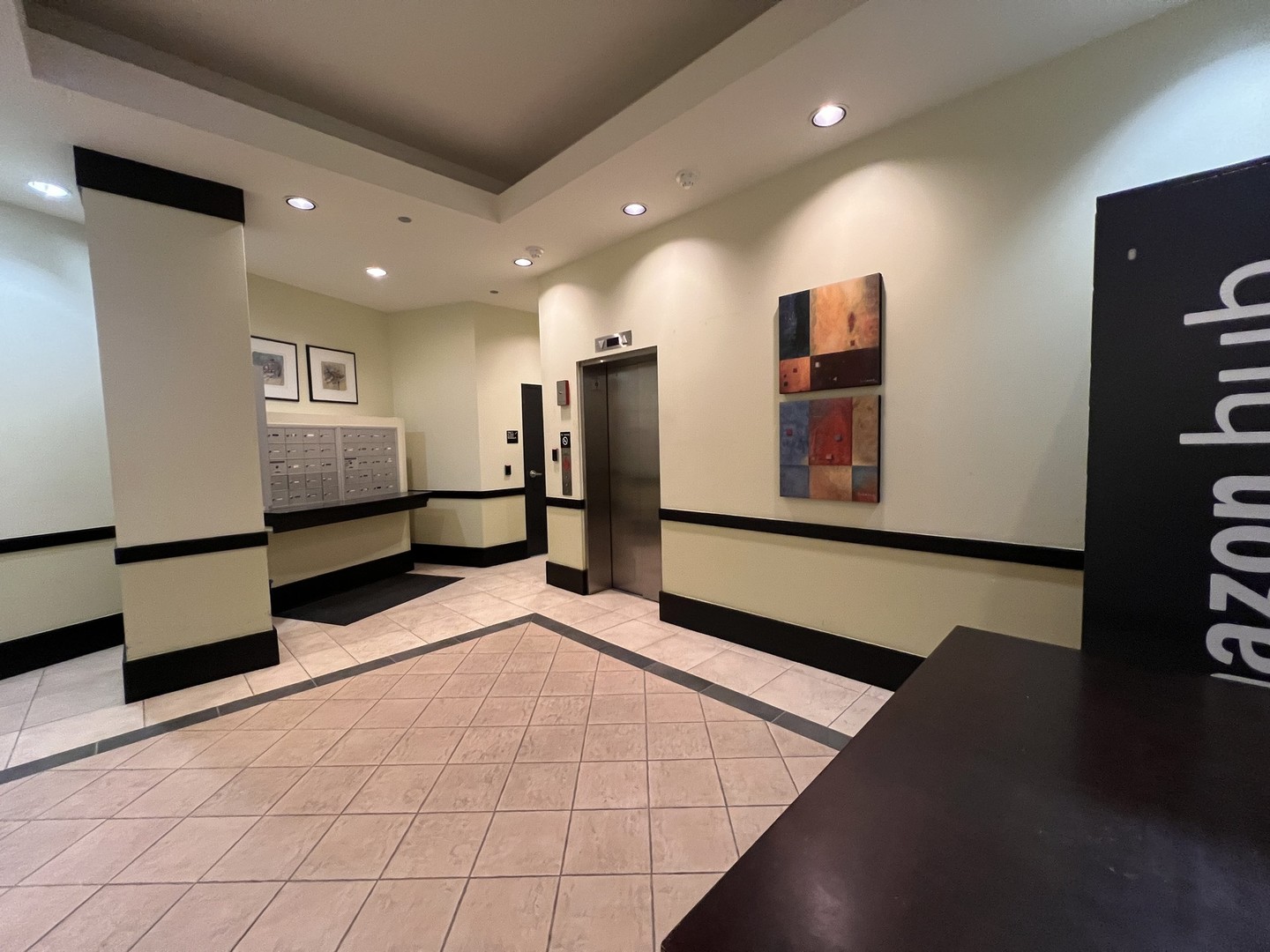 4715 North Racine Avenue, Unit 303 Chicago, IL 60640 - Photo 13 of 18 a view of a living room with a large window