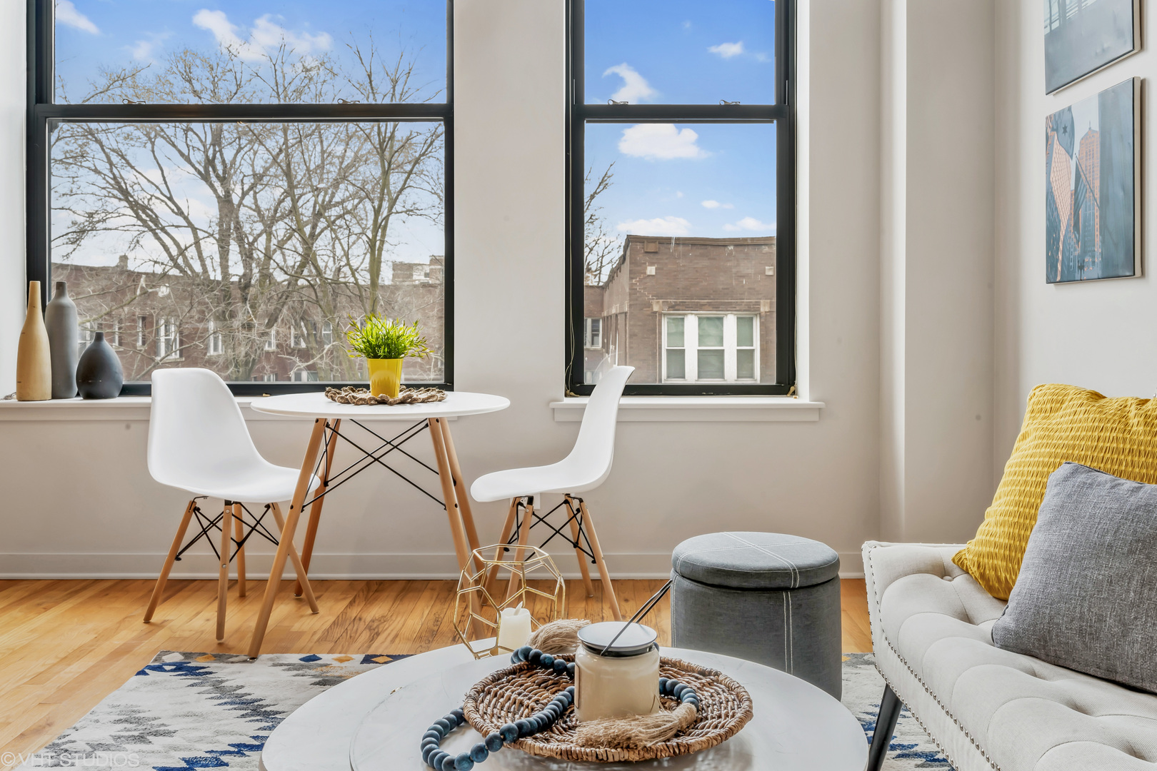 4715 North Racine Avenue, Unit 303 Chicago, IL 60640 - Photo 8 of 18 a living room with furniture and a table