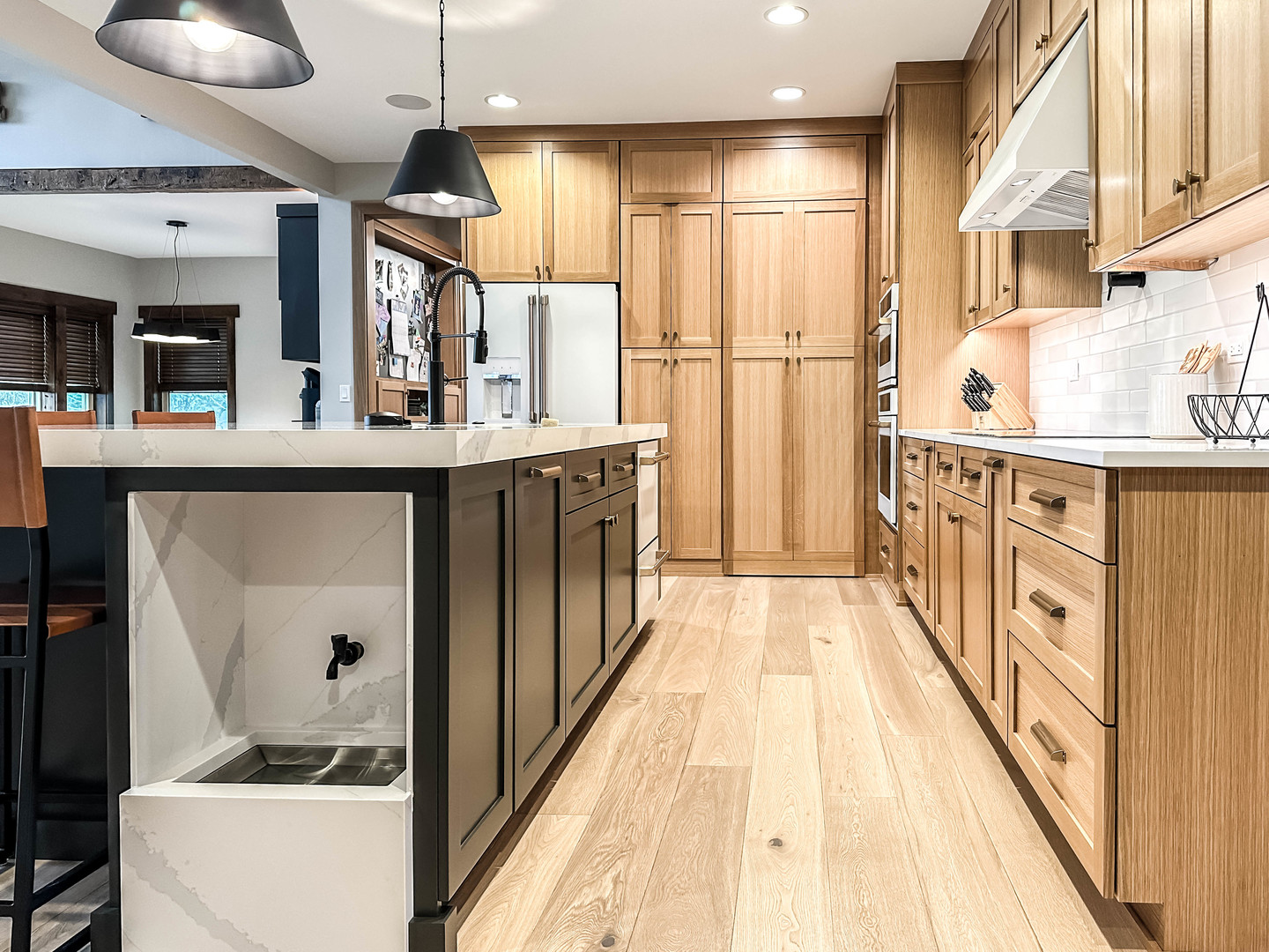 26005 Forrester Drive Plainfield, IL 60585 - Photo 3 of 19 a kitchen with stainless steel appliances granite countertop lots of counter top space and wooden floor