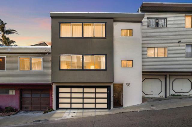 a front view of a house with windows