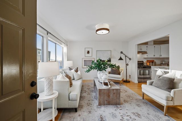 a living room with furniture and a couch