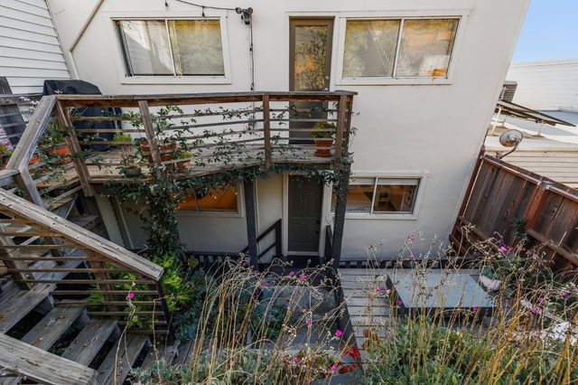 a view of a backyard of the house