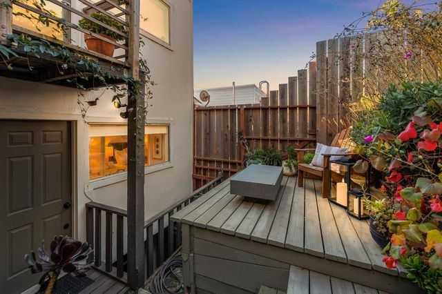 a view of balcony with outdoor seating