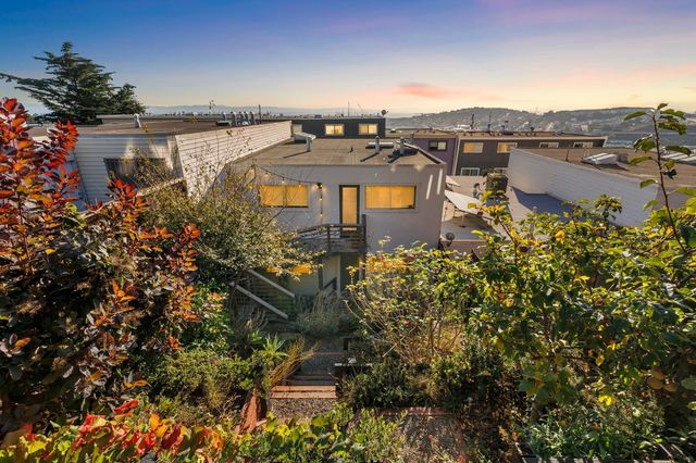 a view of a lake with a building in the background