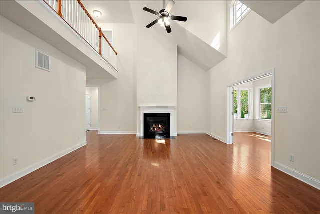 a kitchen with granite countertop a sink and a stove
