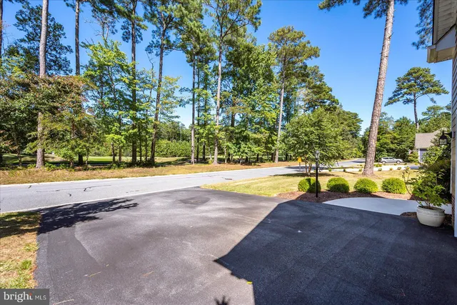 a room with furniture pool table and flat screen tv