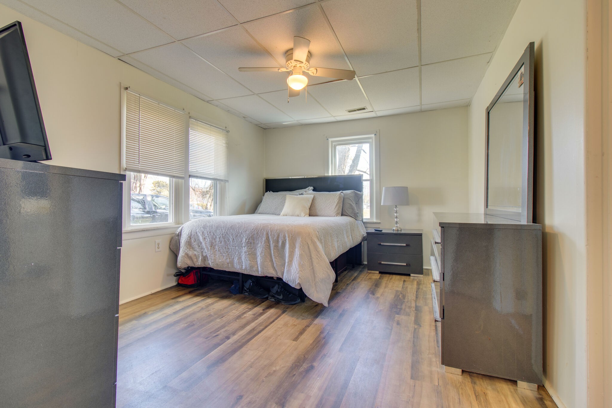 810 Days Road Lafayette, TN 37083 - Photo 11 of 20 a bedroom with a bed and a window with wooden floor