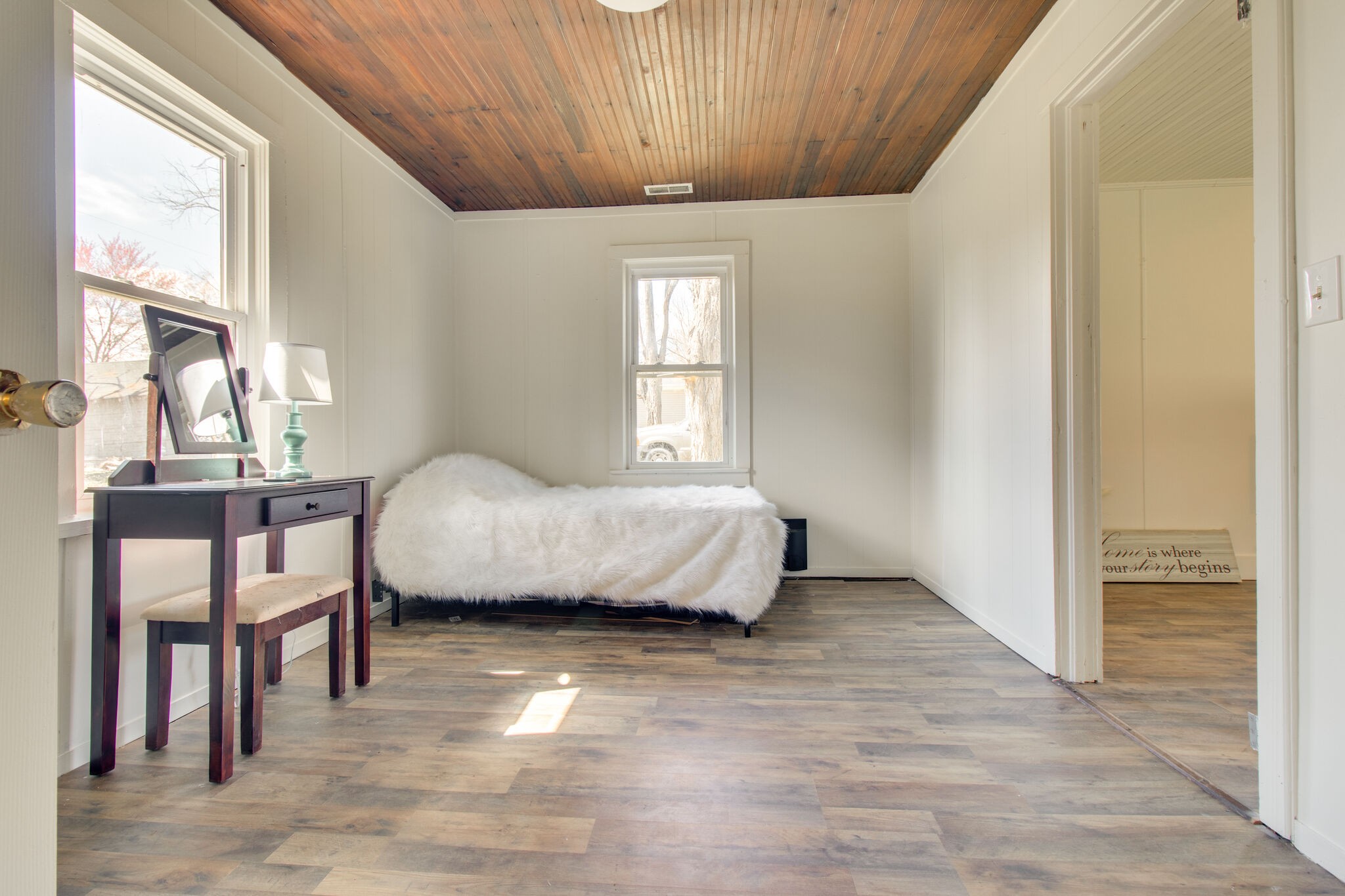 810 Days Road Lafayette, TN 37083 - Photo 17 of 20 a bedroom with a bed and a table
