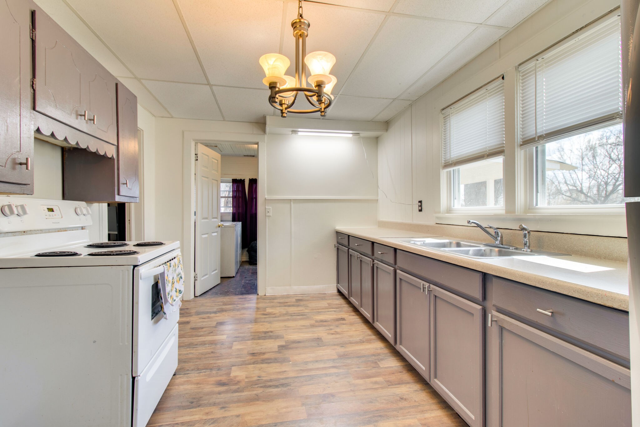 810 Days Road Lafayette, TN 37083 - Photo 9 of 20 a large kitchen with stainless steel appliances granite countertop a sink and cabinets