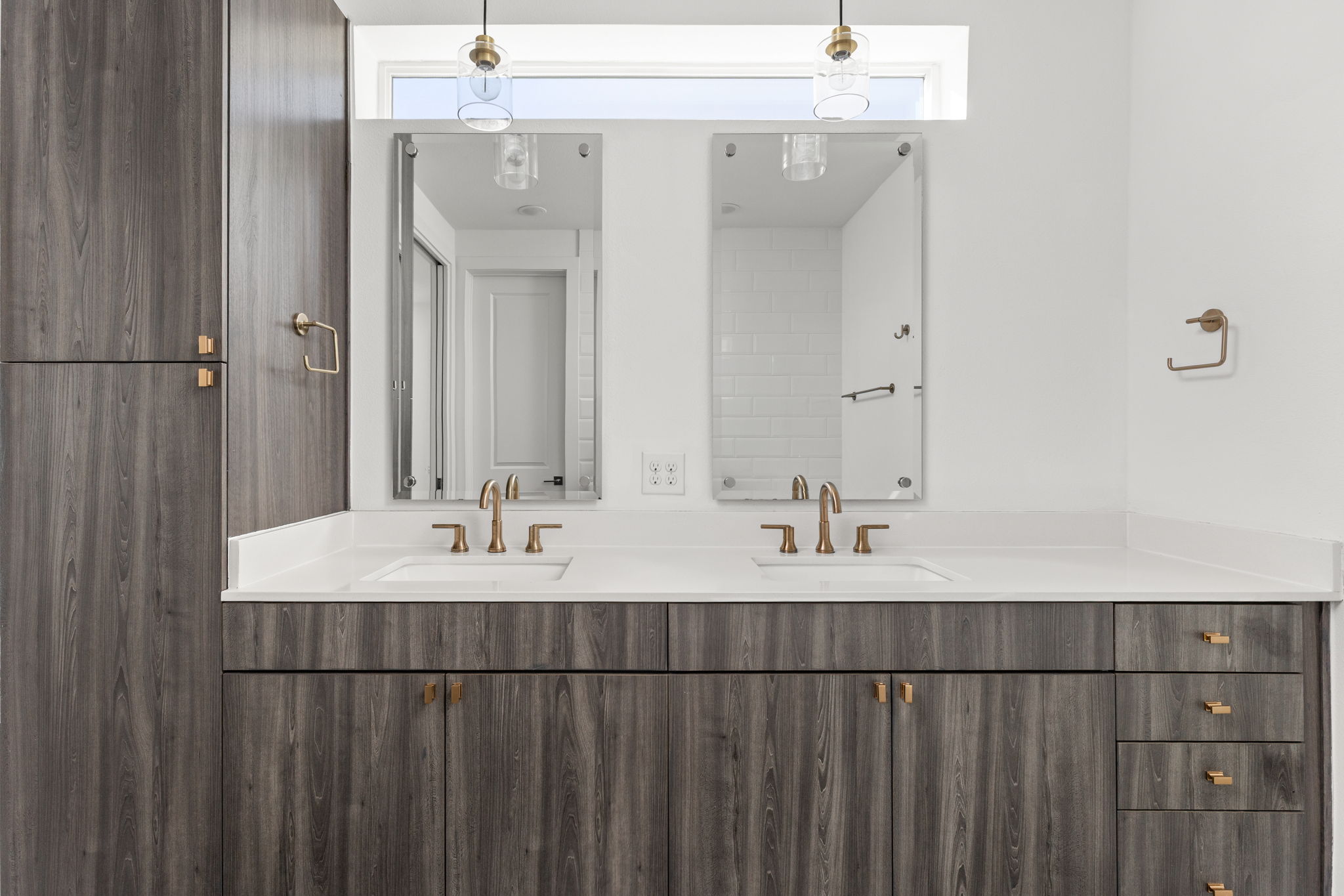2624 Metcalfe Road, Unit 17 Austin, TX 78741 - Photo 22 of 35 a bathroom with a sink and a mirror