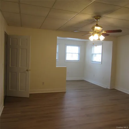an empty room that has a window