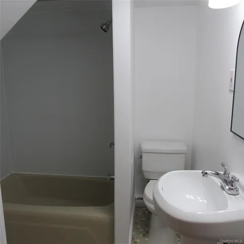 a bathroom with a sink and a toilet