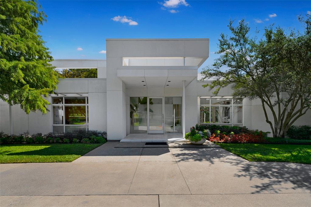 4130 Cochran Chapel Road Dallas, TX 75209 - Photo 12 of 40 a front view of a house with garden