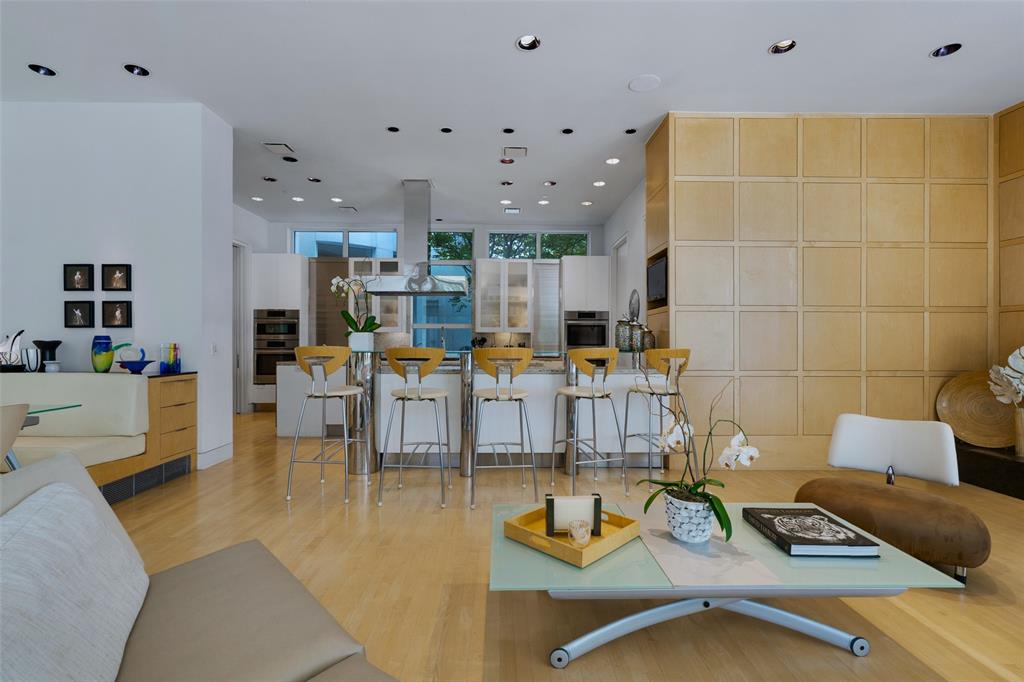 4130 Cochran Chapel Road Dallas, TX 75209 - Photo 17 of 40 a living room with furniture and a dining table with kitchen view