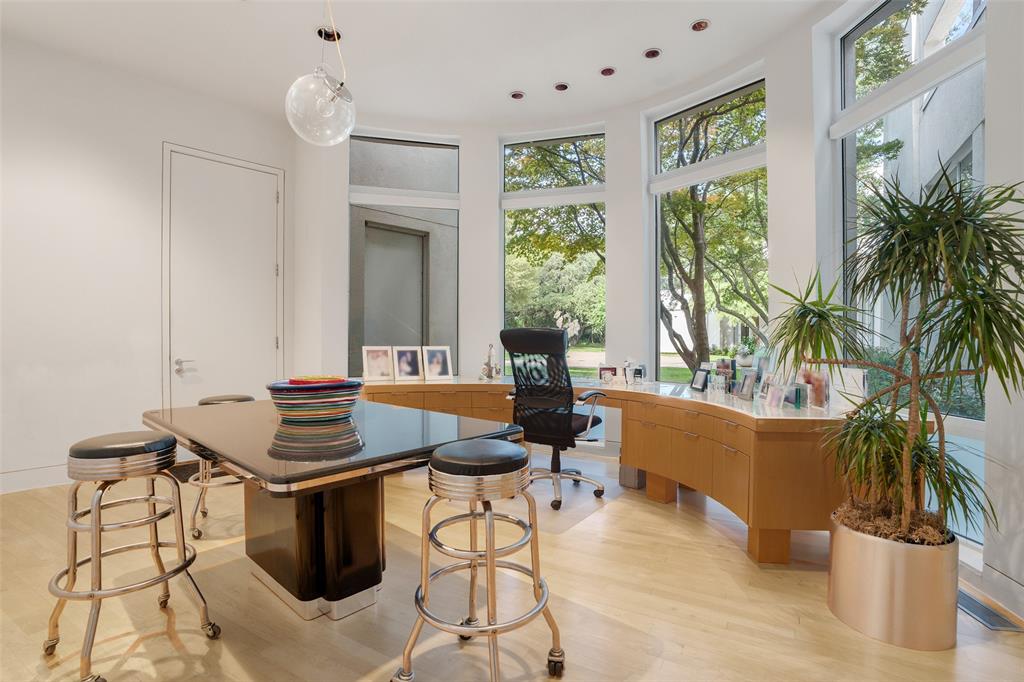 4130 Cochran Chapel Road Dallas, TX 75209 - Photo 24 of 40 a living room with furniture a window and a potted plant