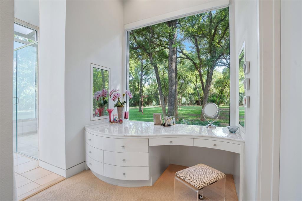 4130 Cochran Chapel Road Dallas, TX 75209 - Photo 28 of 40 a room with a floor to ceiling window and a potted plant