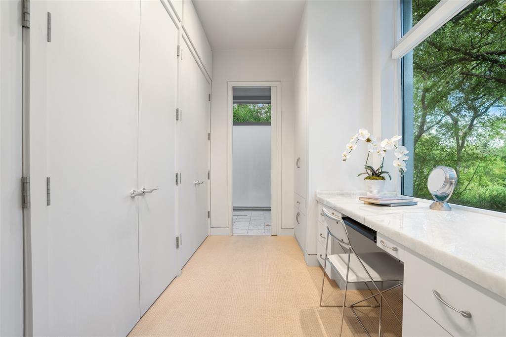4130 Cochran Chapel Road Dallas, TX 75209 - Photo 33 of 40 a bathroom with a sink and mirror