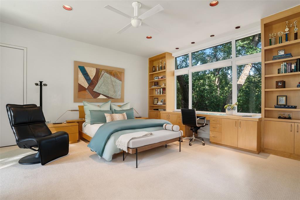 4130 Cochran Chapel Road Dallas, TX 75209 - Photo 35 of 40 a bedroom with furniture and a large window