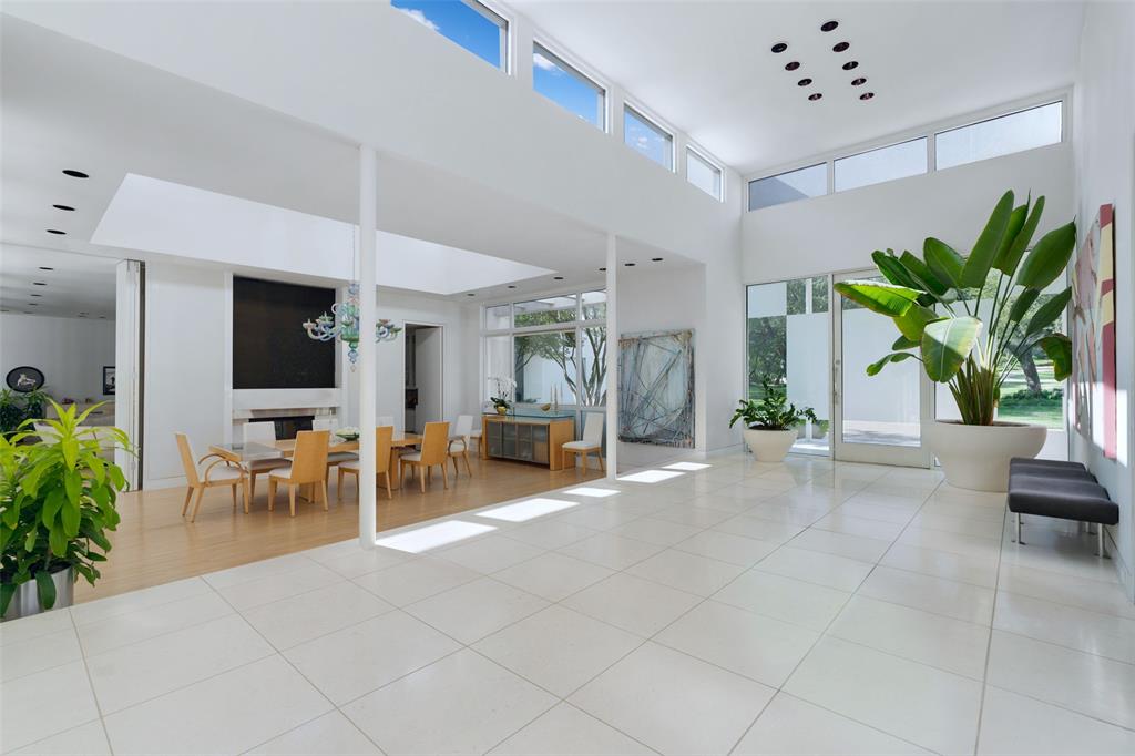 4130 Cochran Chapel Road Dallas, TX 75209 - Photo 6 of 40 a lobby with furniture and a potted plant
