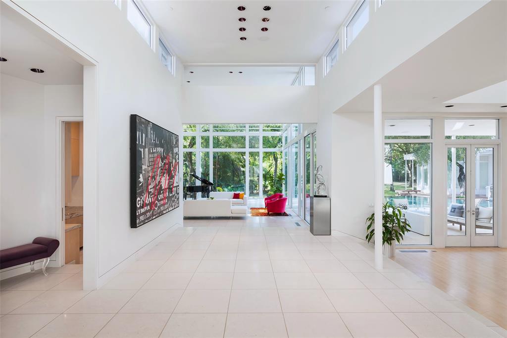 4130 Cochran Chapel Road Dallas, TX 75209 - Photo 7 of 40 a view of a room with furniture wooden floor and windows