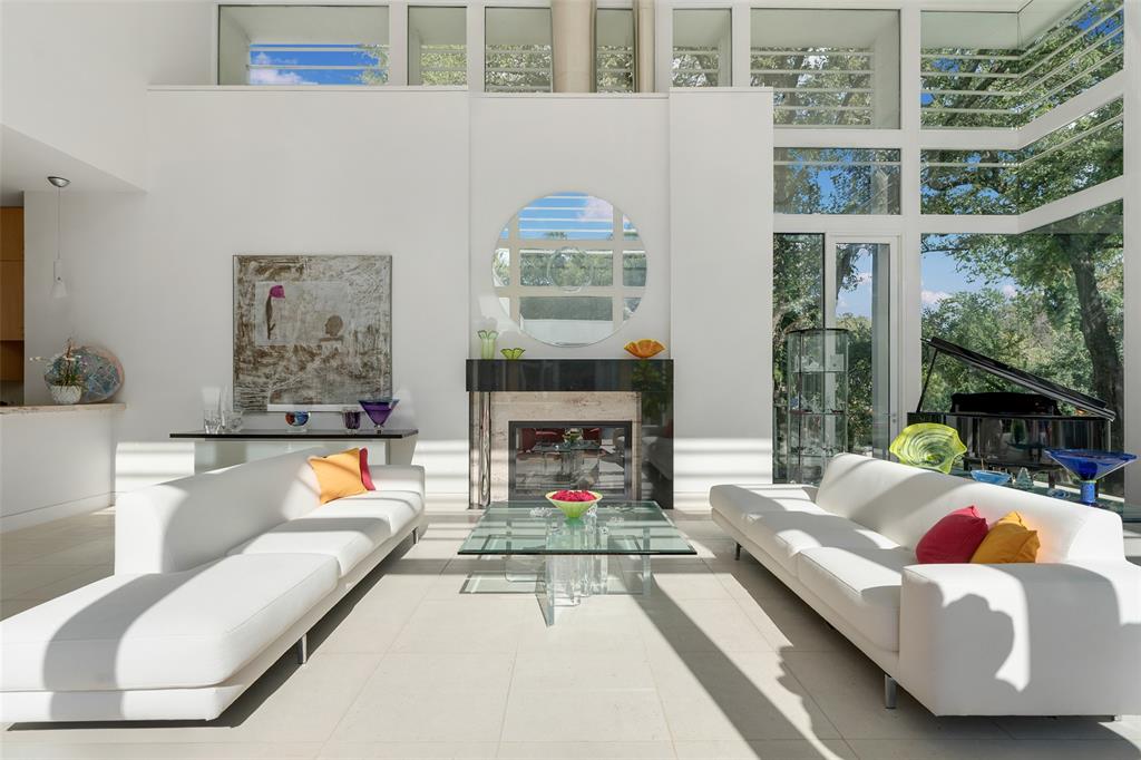 4130 Cochran Chapel Road Dallas, TX 75209 - Photo 9 of 40 a living room with furniture fireplace and flat screen tv