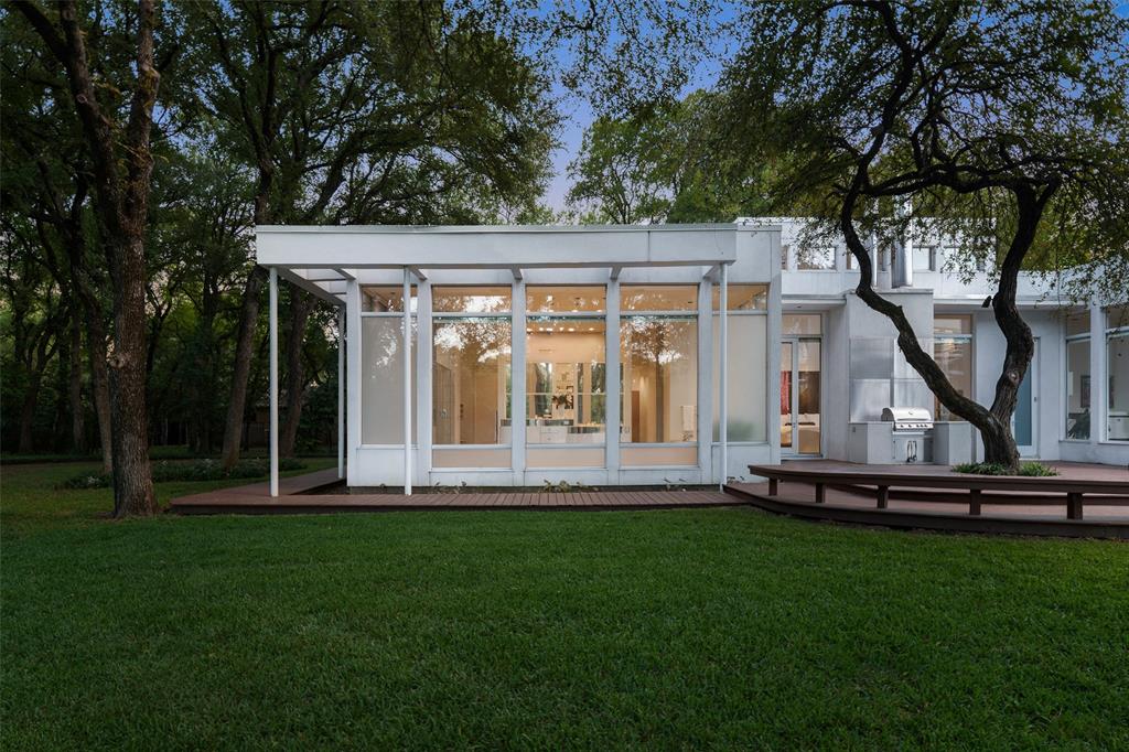 4130 Cochran Chapel Road Dallas, TX 75209 - Photo 10 of 40 a view of a house with backyard and garden