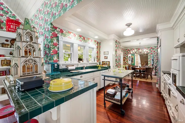 a living room with fireplace furniture and a flat screen tv