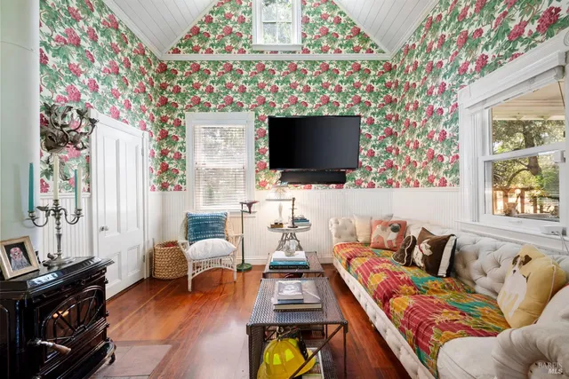 a bathroom with a sink a toilet a shower and a mirror