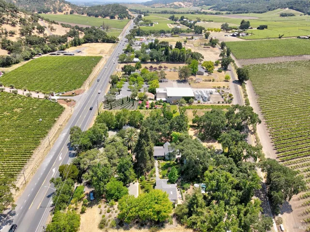 a front view of a house with a yard and porch