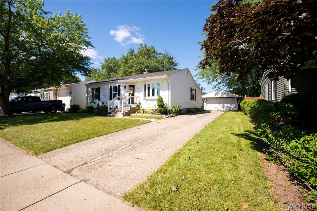 160 Frederick Road Tonawanda, NY 14150 - Photo 4 of 47 LONG CONCRETE PARKING AREA TO A 2 CAR GARAGE WITH REMOTE