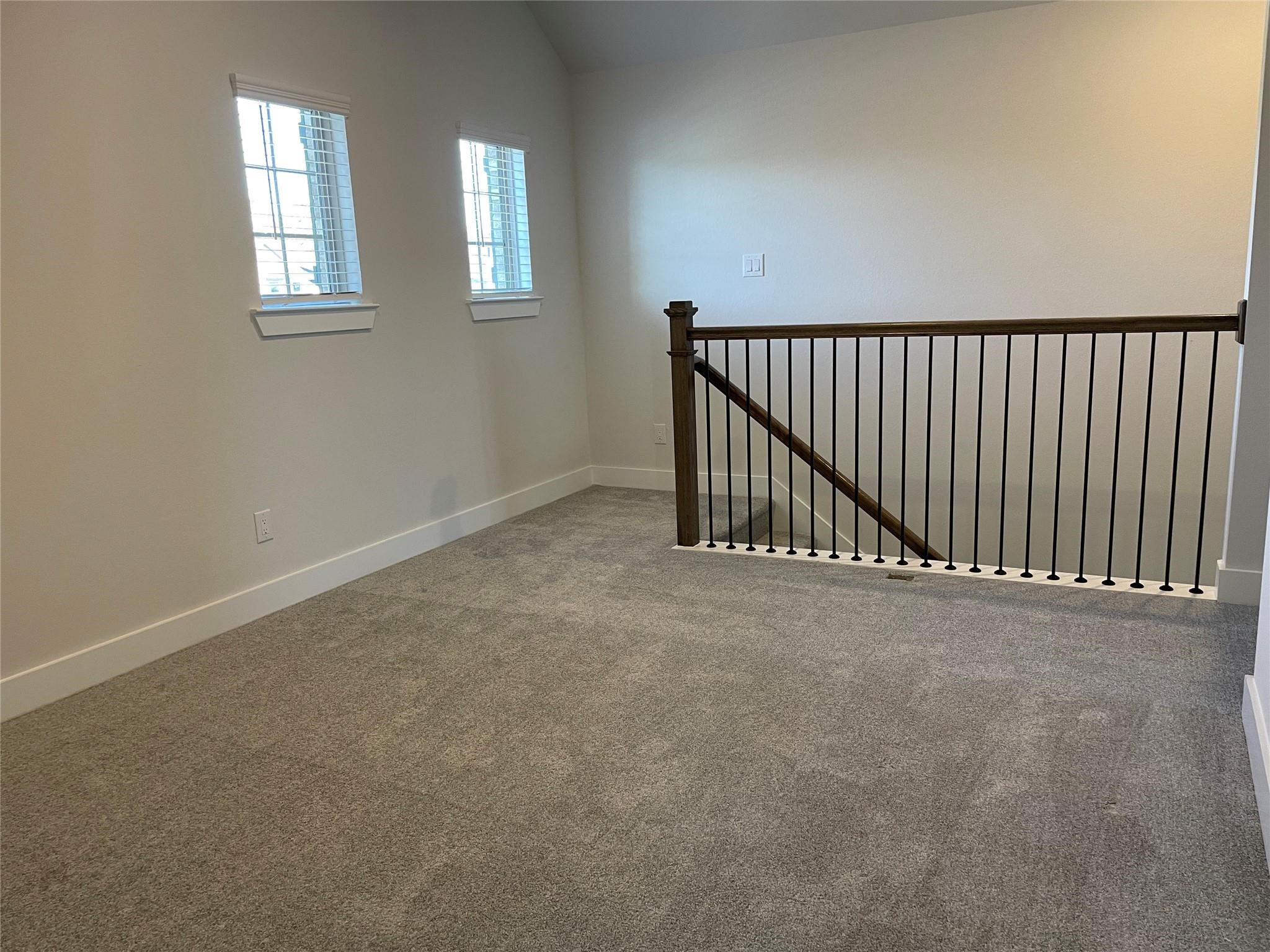 10638 Whitejacket Conroe, TX 77385 - Photo 5 of 25 a view of a hallway with a window