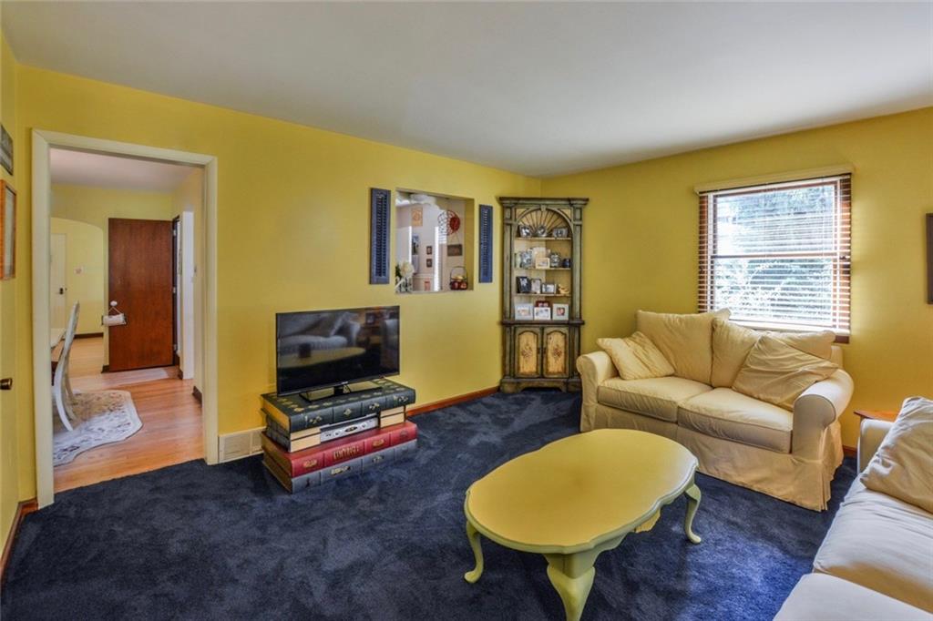 9621 Hilliard Road Pittsburgh, PA 15237 - Photo 11 of 25 Family Room- cozy and bright. This room has a door to the back yard!